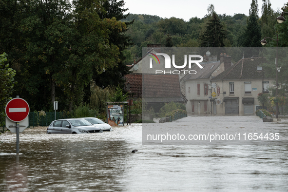 Flooded street and cars in Pommeuse, Seine-et-Marne department, east of Paris, on October 10, 2024, as the heavy rains associated with the K...