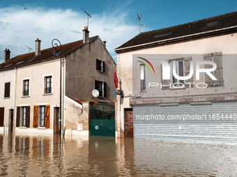 A flooded street is in Coulommiers, Seine-et-Marne department, east of Paris, on October 10, 2024, as the heavy rains associated with the Ki...