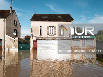 A flooded street is in Coulommiers, Seine-et-Marne department, east of Paris, on October 10, 2024, as the heavy rains associated with the Ki...