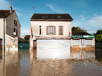 A flooded street is in Coulommiers, Seine-et-Marne department, east of Paris, on October 10, 2024, as the heavy rains associated with the Ki...