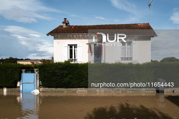 A flooded street is in Coulommiers, Seine-et-Marne department, east of Paris, on October 10, 2024, as the heavy rains associated with the Ki...