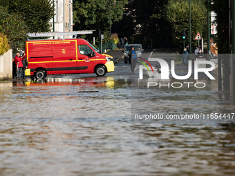 A flooded street is in Coulommiers, Seine-et-Marne department, east of Paris, on October 10, 2024, as the heavy rains associated with the Ki...