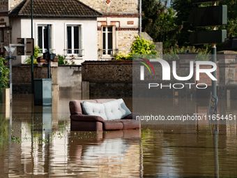 A flooded street is in Coulommiers, Seine-et-Marne department, east of Paris, on October 10, 2024, as the heavy rains associated with the Ki...