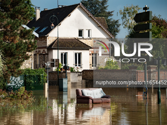 A flooded street is in Coulommiers, Seine-et-Marne department, east of Paris, on October 10, 2024, as the heavy rains associated with the Ki...