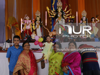 Hindu devotees visit a puja mandap during the Durga Puja festival in Dhaka, Bangladesh, on October 10, 2024. (