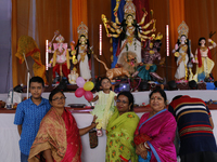 Hindu devotees visit a puja mandap during the Durga Puja festival in Dhaka, Bangladesh, on October 10, 2024. (