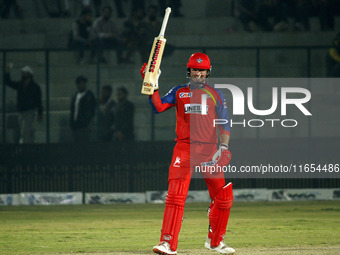 Ben Dunk of India Capitals raises his bat after scoring 50 during the Legends League Cricket T20 match between Manipal Tigers and India Capi...