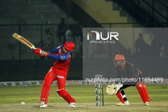 Ben Dunk (L) of India Capitals plays a shot during the Legends League Cricket T20 match between Manipal Tigers and India Capitals at the Bak...