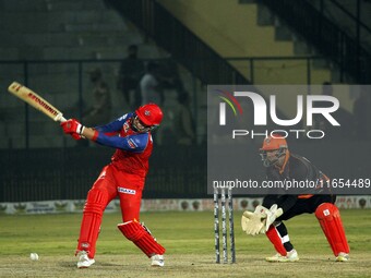 Ben Dunk (L) of India Capitals plays a shot during the Legends League Cricket T20 match between Manipal Tigers and India Capitals at the Bak...