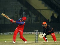 Ben Dunk (L) of India Capitals plays a shot during the Legends League Cricket T20 match between Manipal Tigers and India Capitals at the Bak...