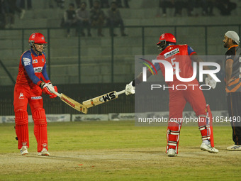 Ben Dunk (left) and Ashley Nurse (right) of India Capitals react during the Legends League Cricket T20 match between Manipal Tigers and Indi...