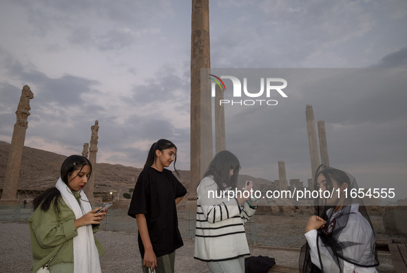 Young Iranian girls visit the Persepolis historical site near the city of Shiraz in Fars province, about 932 km (579 miles) south of Tehran,...