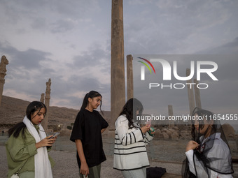 Young Iranian girls visit the Persepolis historical site near the city of Shiraz in Fars province, about 932 km (579 miles) south of Tehran,...