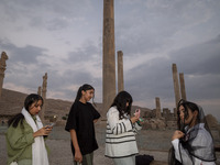 Young Iranian girls visit the Persepolis historical site near the city of Shiraz in Fars province, about 932 km (579 miles) south of Tehran,...