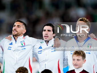 Lorenzo Pellegrini of Italy sings national anthem with Matteo Retegui and Sandro Tonali during the UEFA Nations League 2024/25 League A Grou...