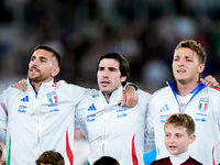 Lorenzo Pellegrini of Italy sings national anthem with Matteo Retegui and Sandro Tonali during the UEFA Nations League 2024/25 League A Grou...