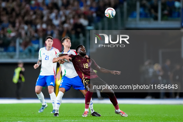 Samuele Ricci of Italy and Orel Mangala of Belgium compete for the ball during the UEFA Nations League 2024/25 League A Group A2 match betwe...