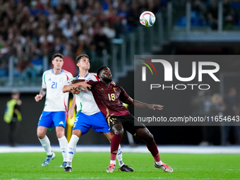 Samuele Ricci of Italy and Orel Mangala of Belgium compete for the ball during the UEFA Nations League 2024/25 League A Group A2 match betwe...