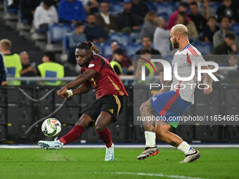 Jeremy Doku (BEL) and Federico Dimarco (ITA) participate in the UEFA National League Matchday 3 match between Italy and Belgium at the Olymp...