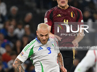 Wout Faes (BEL) and Federico Dimarco (ITA) are in action during the UEFA National League Matchday 3 match between Italy and Belgium at the O...