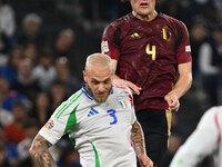 Wout Faes (BEL) and Federico Dimarco (ITA) are in action during the UEFA National League Matchday 3 match between Italy and Belgium at the O...