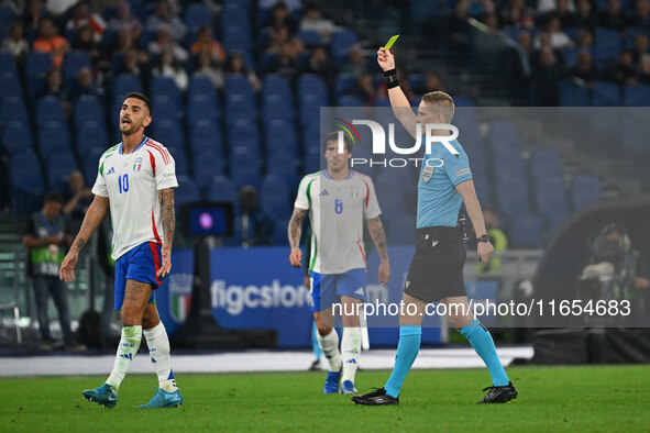 Lorenzo Pellegrini (ITA) and Referee Espen Eskas (NOR) are present during the UEFA National League Matchday 3 match between Italy and Belgiu...