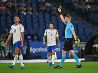 Lorenzo Pellegrini (ITA) and Referee Espen Eskas (NOR) are present during the UEFA National League Matchday 3 match between Italy and Belgiu...