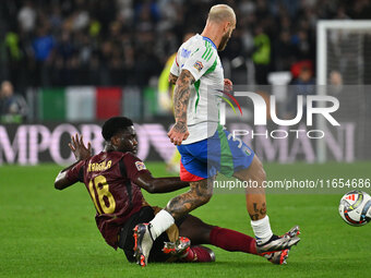 Orel Mangala (BEL) and Federico Dimarco (ITA) are in action during the UEFA National League Matchday 3 match between Italy and Belgium at th...