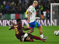 Orel Mangala (BEL) and Federico Dimarco (ITA) are in action during the UEFA National League Matchday 3 match between Italy and Belgium at th...