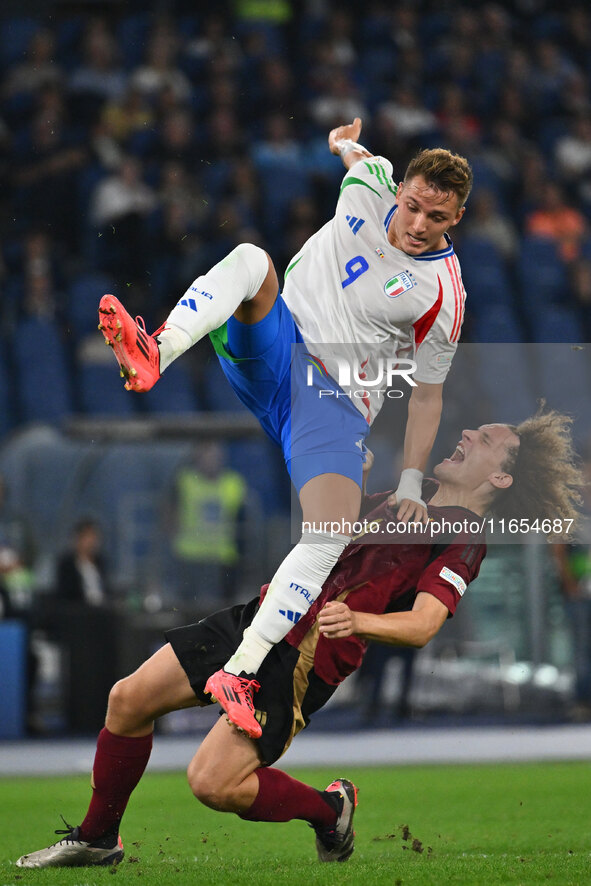 Mateo Retegui (ITA) and Wout Faes (BEL) are in action during the UEFA National League Matchday 3 match between Italy and Belgium at the Olym...