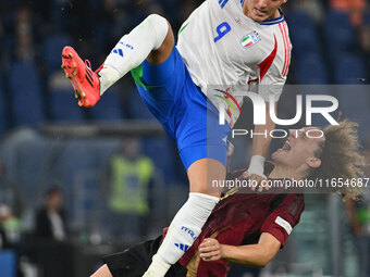 Mateo Retegui (ITA) and Wout Faes (BEL) are in action during the UEFA National League Matchday 3 match between Italy and Belgium at the Olym...