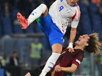 Mateo Retegui (ITA) and Wout Faes (BEL) are in action during the UEFA National League Matchday 3 match between Italy and Belgium at the Olym...