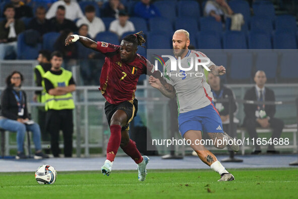 Jeremy Doku (BEL) and Federico Dimarco (ITA) are in action during the UEFA National League Matchday 3 match between Italy and Belgium at the...