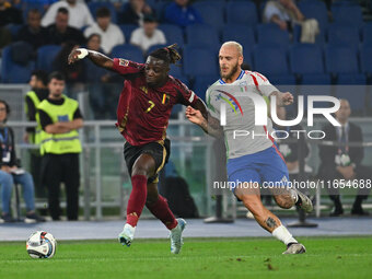 Jeremy Doku (BEL) and Federico Dimarco (ITA) are in action during the UEFA National League Matchday 3 match between Italy and Belgium at the...