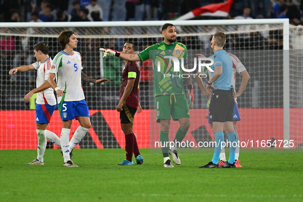 Gianluigi Donnarumma (ITA) and Referee Espen Eskas (NOR) are present during the UEFA National League Matchday 3 match between Italy and Belg...