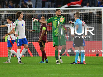 Gianluigi Donnarumma (ITA) and Referee Espen Eskas (NOR) are present during the UEFA National League Matchday 3 match between Italy and Belg...