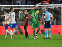 Gianluigi Donnarumma (ITA) and Referee Espen Eskas (NOR) are present during the UEFA National League Matchday 3 match between Italy and Belg...