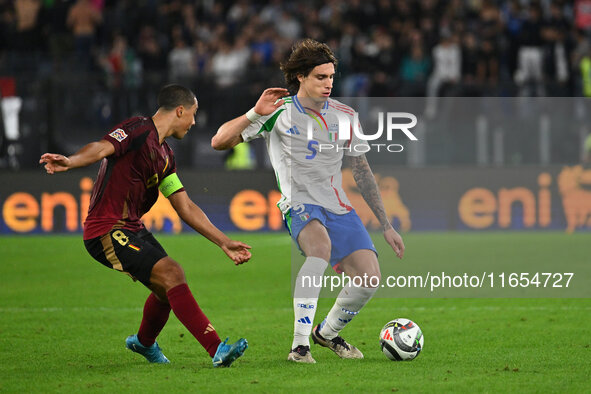 Youri Tielemans (BEL) and Riccardo Calafiori (ITA) are in action during the UEFA Nations League Matchday 3 match between Italy and Belgium a...