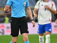 Referee Espen Eskas (NOR) officiates during the UEFA National League Matchday 3 match between Italy and Belgium at the Olympic Stadium in Ro...