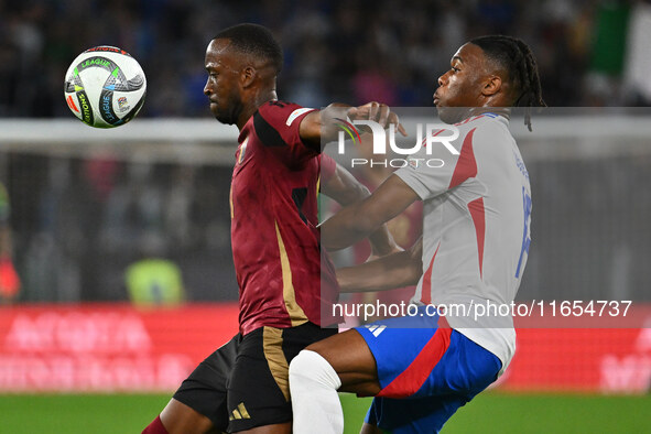 Dodi Lukebakio (BEL) and Destiny Udogie (ITA) are in action during the UEFA Nations League Matchday 3 match between Italy and Belgium at the...