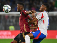 Dodi Lukebakio (BEL) and Destiny Udogie (ITA) are in action during the UEFA Nations League Matchday 3 match between Italy and Belgium at the...