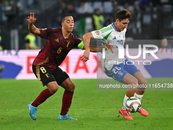 Youri Tielemans (BEL) and Andrea Cambiaso (ITA) are in action during the UEFA Nations League Matchday 3 match between Italy and Belgium at t...