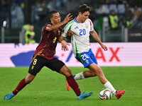 Youri Tielemans (BEL) and Andrea Cambiaso (ITA) are in action during the UEFA Nations League Matchday 3 match between Italy and Belgium at t...