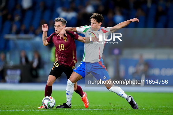 Leonardo Trossard of Belgium and Samuele Ricci of Italy compete for the ball during the UEFA Nations League 2024/25 League A Group A2 match...