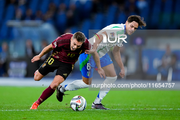 Leonardo Trossard of Belgium and Samuele Ricci of Italy compete for the ball during the UEFA Nations League 2024/25 League A Group A2 match...