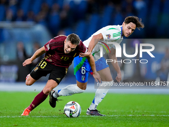 Leonardo Trossard of Belgium and Samuele Ricci of Italy compete for the ball during the UEFA Nations League 2024/25 League A Group A2 match...