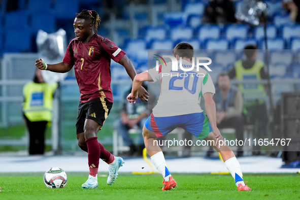 Jeremy Doku of Belgium and Andrea Cambiaso of Italy compete for the ball during the UEFA Nations League 2024/25 League A Group A2 match betw...