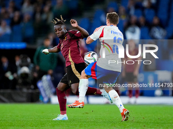 Jeremy Doku of Belgium and Davide Frattesi of Italy compete for the ball during the UEFA Nations League 2024/25 League A Group A2 match betw...