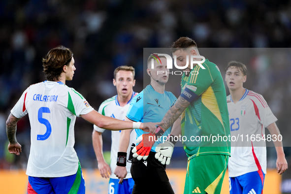 Gianluigi Donnarumma of Italy protests with the referee Espen Eskas for a penalty kick during the UEFA Nations League 2024/25 League A Group...