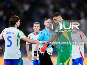 Gianluigi Donnarumma of Italy protests with the referee Espen Eskas for a penalty kick during the UEFA Nations League 2024/25 League A Group...